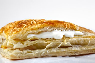 Puffs with sauce and cheese