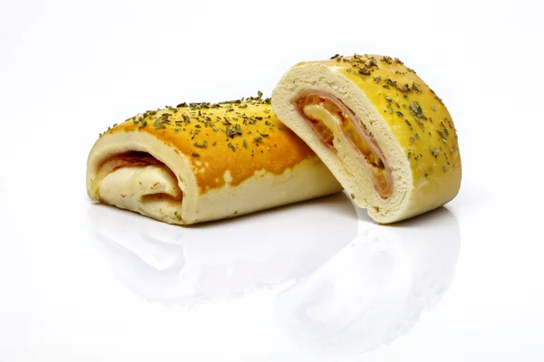 Rolled bun with cheese and vegetables — Stock Photo, Image