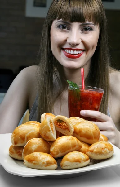 Young woman enjoying strawberry cocktail — Stock Photo, Image