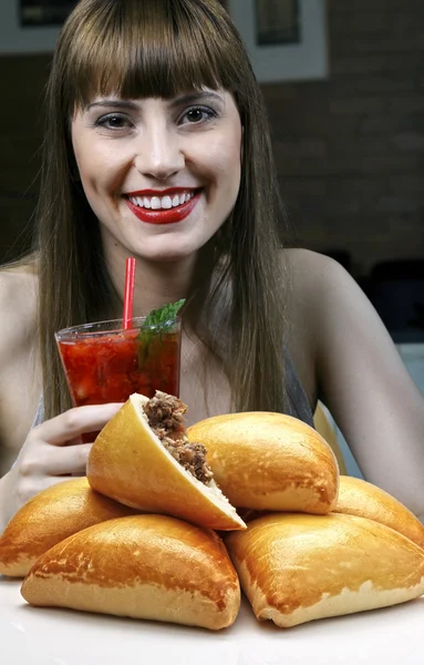 Young woman enjoying strawberry cocktail — Stock Photo, Image