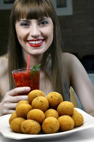 Young woman enjoying strawberry cocktail — Stock Photo, Image