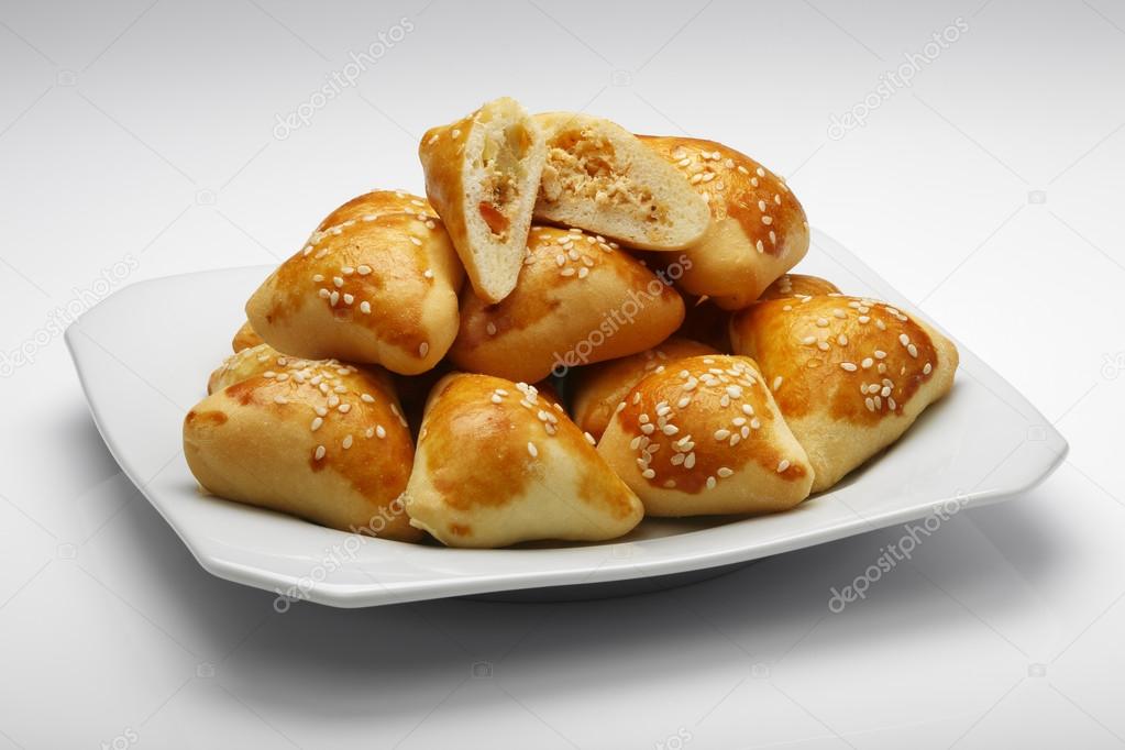 Buns with sesame and cheese stuffing