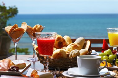 Breakfast  with fruits, buns and  juices