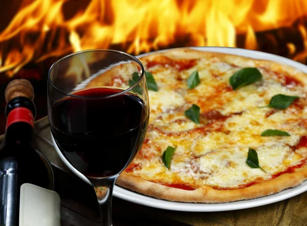 Pizza with glass of wine — Stock Photo, Image