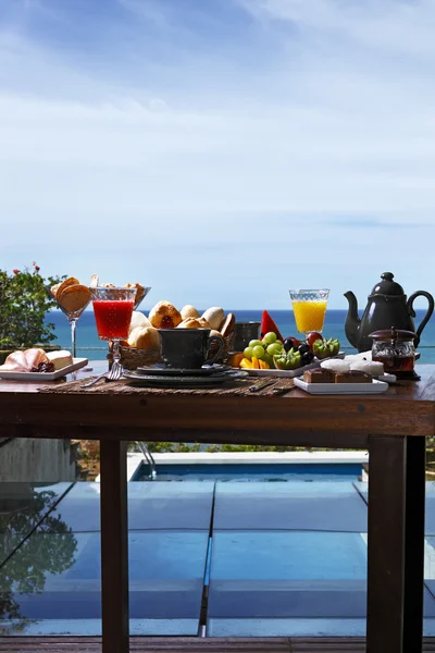 Breakfast  with fruits, buns and  juices — Stock Fotó