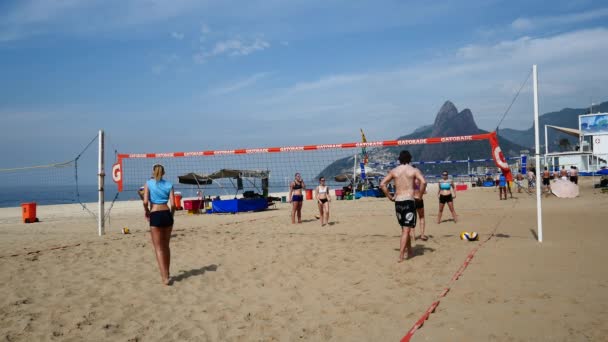 People playing volleyball at the Beach