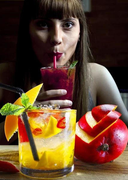 woman in restaurant with cocktail