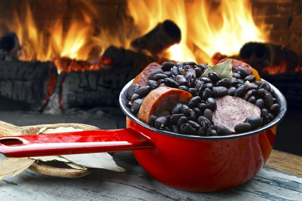 Feijoada on a red pot — Stock Photo, Image