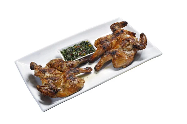 Roasted cockrel with sauce — Stock Photo, Image