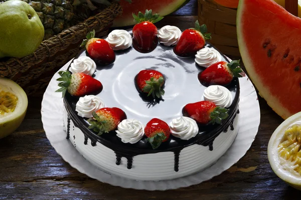 Strawberry birthday cake with whipped cream — Stock Photo, Image
