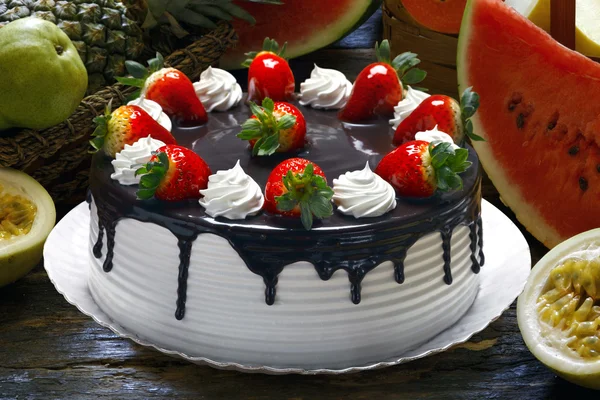 Strawberry birthday cake with whipped cream — Stock Photo, Image