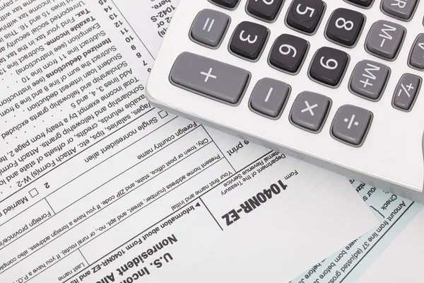 Kalkulačka daňové formuláře pozadí — Stock fotografie