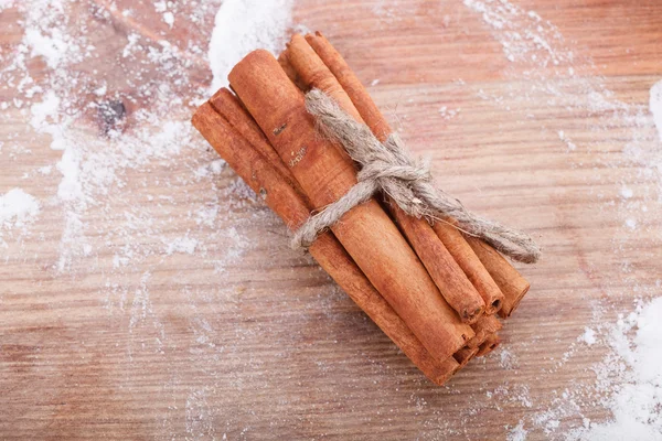 Cinnamon sticks tied with a rope — Stock Photo, Image