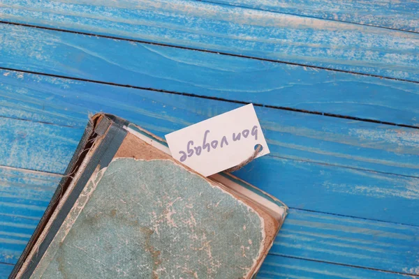Franch seyahat işareti ve eski kitap - vintage tarzı — Stok fotoğraf