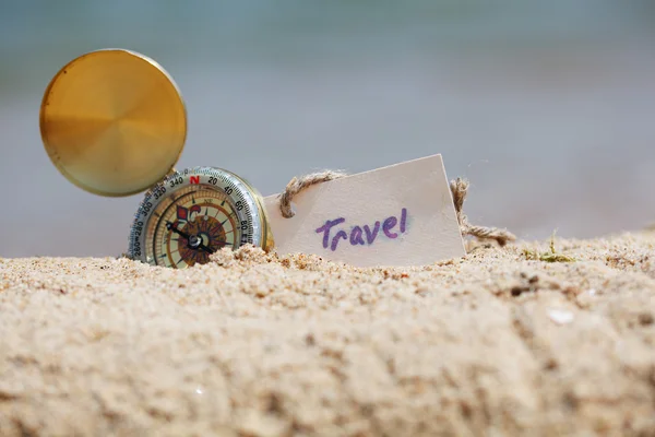 Compass in the sand with Message - Travel — Stock Photo, Image