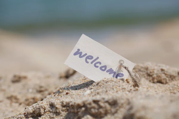 Mensagem Bem-vindo na areia — Fotografia de Stock