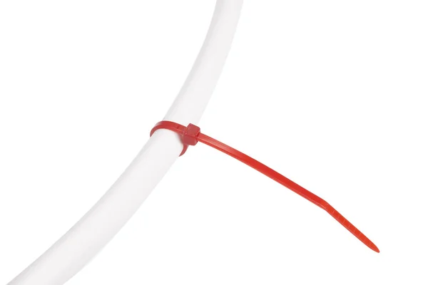 Red cable tie with electric wire — Stock Photo, Image