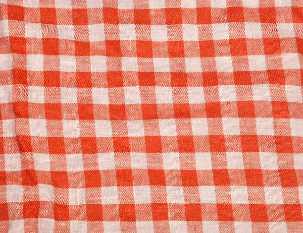 Toalha de mesa vermelho e branco xadrez ondulado textura fundo — Fotografia de Stock