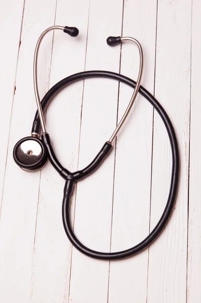 Stethoscope on a white table — Stock Photo, Image