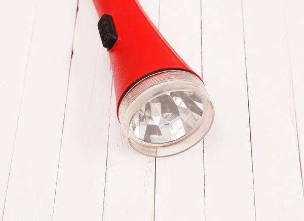 Lanterna vermelha em uma mesa branca — Fotografia de Stock
