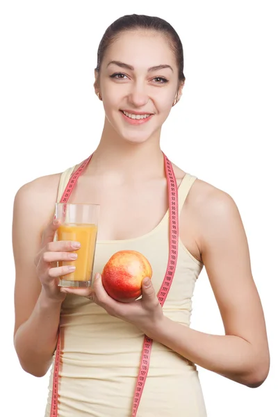 Schönes Mädchen mit Saft und Apfel — Stockfoto