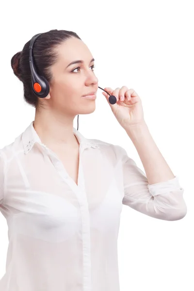 Portrait of happy smiling cheerful young support phone operator in headset showing copyspace area or something, isolated on white background Stock Image