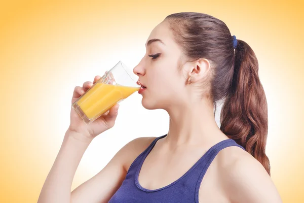 Pretty woman drinking a health drink — Stock Photo, Image