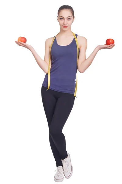Beautiful girl holding apples in two hands — Stock Photo, Image