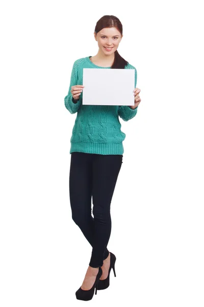 Cute yang woman holding a white banner and smiling — Stock Photo, Image