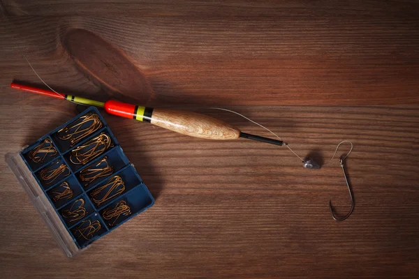 Ferramentas de pesca gancho e bobber — Fotografia de Stock