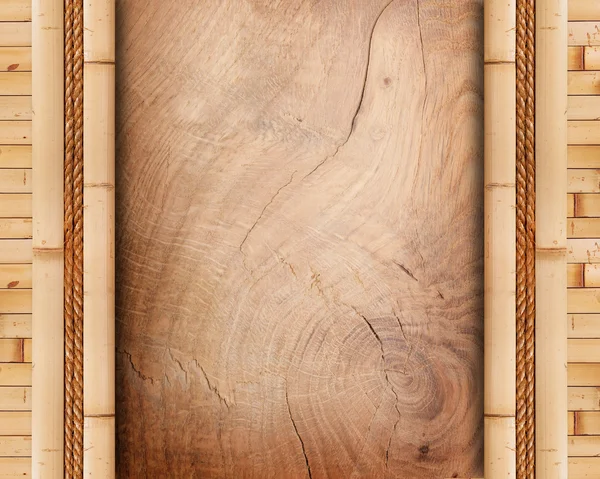 Wood board with bamboo frame — Stock Photo, Image