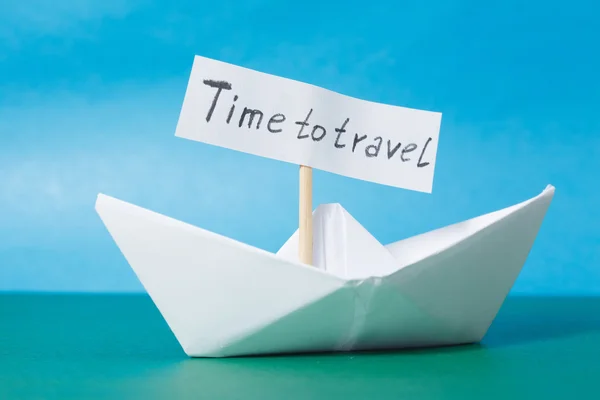 Paper Boat with a sign Time to travel - travel concept — Stock Photo, Image