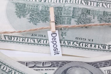 Money and business idea, The dollar bills with rope, with a sign - Deposit