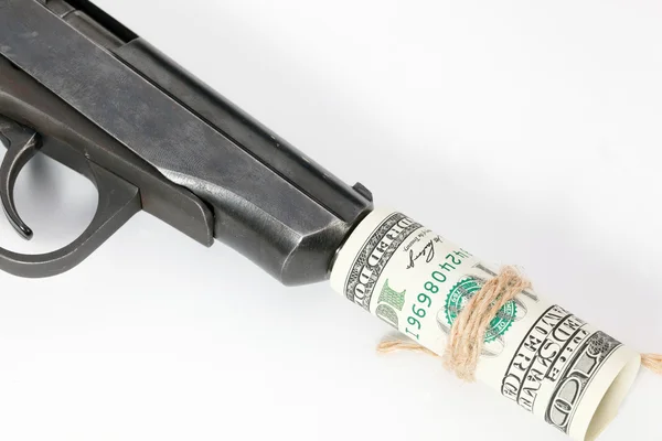 Pistolul negru se află pe bancnote de dolari — Fotografie, imagine de stoc