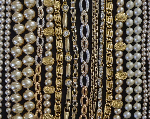 Variety of golden jewelery — Stock Photo, Image