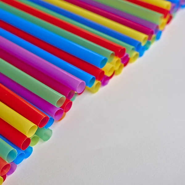 Drinking straws on white paper, space for typing — Stock Photo, Image