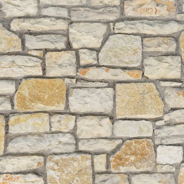 Random cut stone wall — Stock Photo, Image