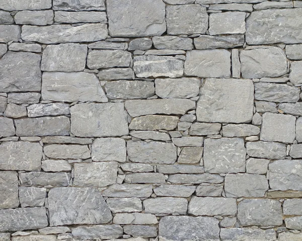 Серая каменная стена — стоковое фото