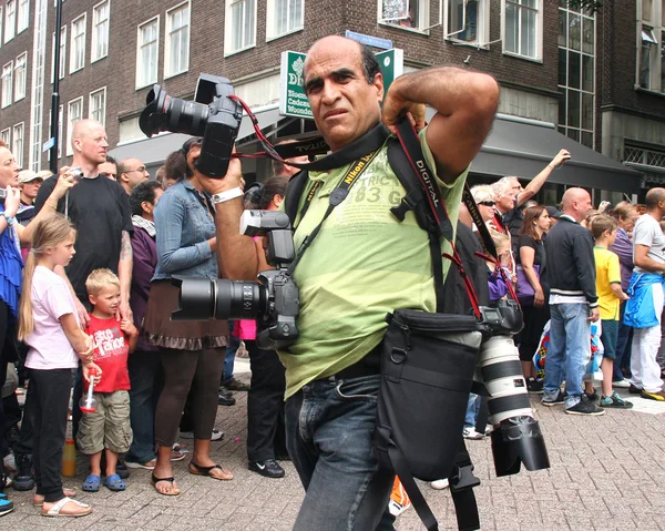 Zpravodajský fotograf festivalu karneval — Stock fotografie