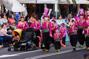 Santa Cruz de Tenerife, Spain,  February 17, 2026. Performers in spectacular colorful costumes parade during the Carnival of Santa Cruz de Tenerife, one of the largest street carnivals in Europe.