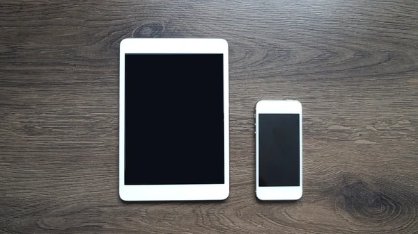 Tablet ve ahşap doku Smartphone'da kadar alay