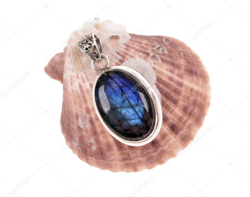 silver jewelry pendant with a stone