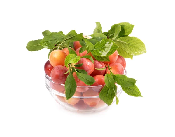 Fresh plums in a glass container — Stock Photo, Image