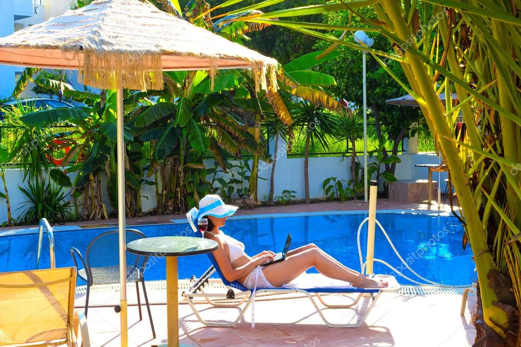 Relaxing by the pool