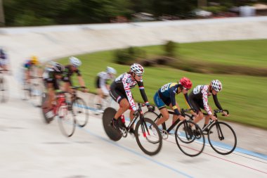 Female Cyclists Motion Blur In Race At Atlanta Velodrome clipart