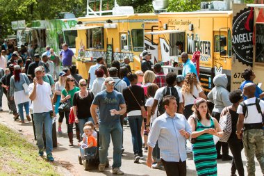 People Buy Meals From Wide Selection Of Atlanta Food Trucks clipart