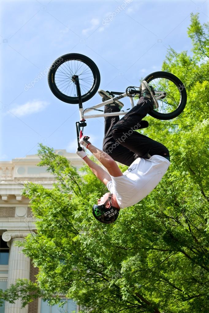 Pro Rider Flips Upside Down In BMX Bike Competition Stock Editorial