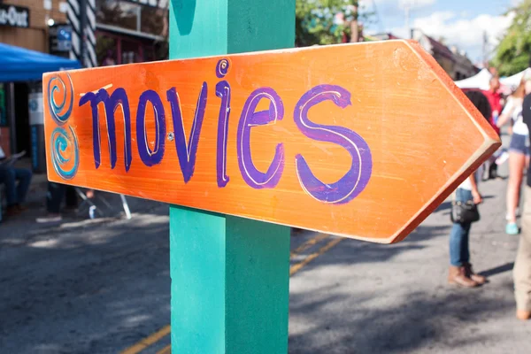 Handmade Festival Sign Says Movies And Points In Right Direction — Stock Photo, Image