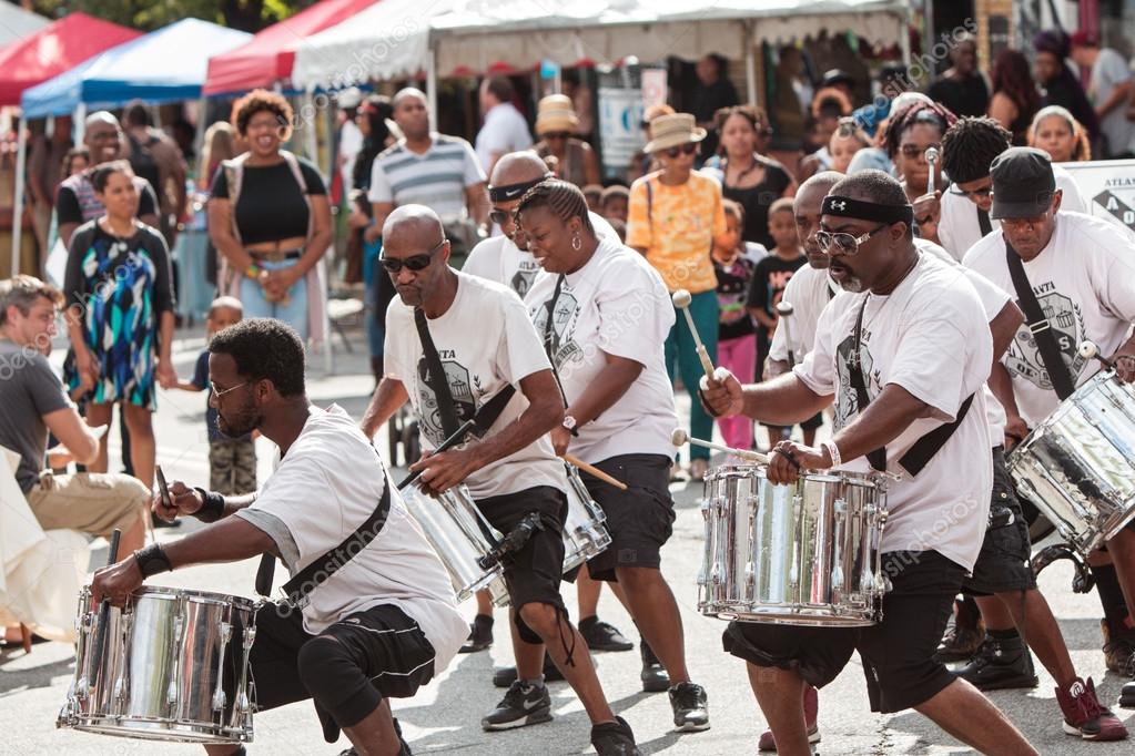 Members Of Adult Drum Group Perform At Atlanta Festival Stock