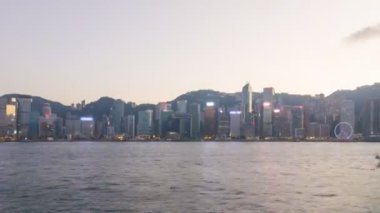 Zaman atlamalı gün gece hong Kong'a cityscape victoria Limanı ve Senfoni ışık